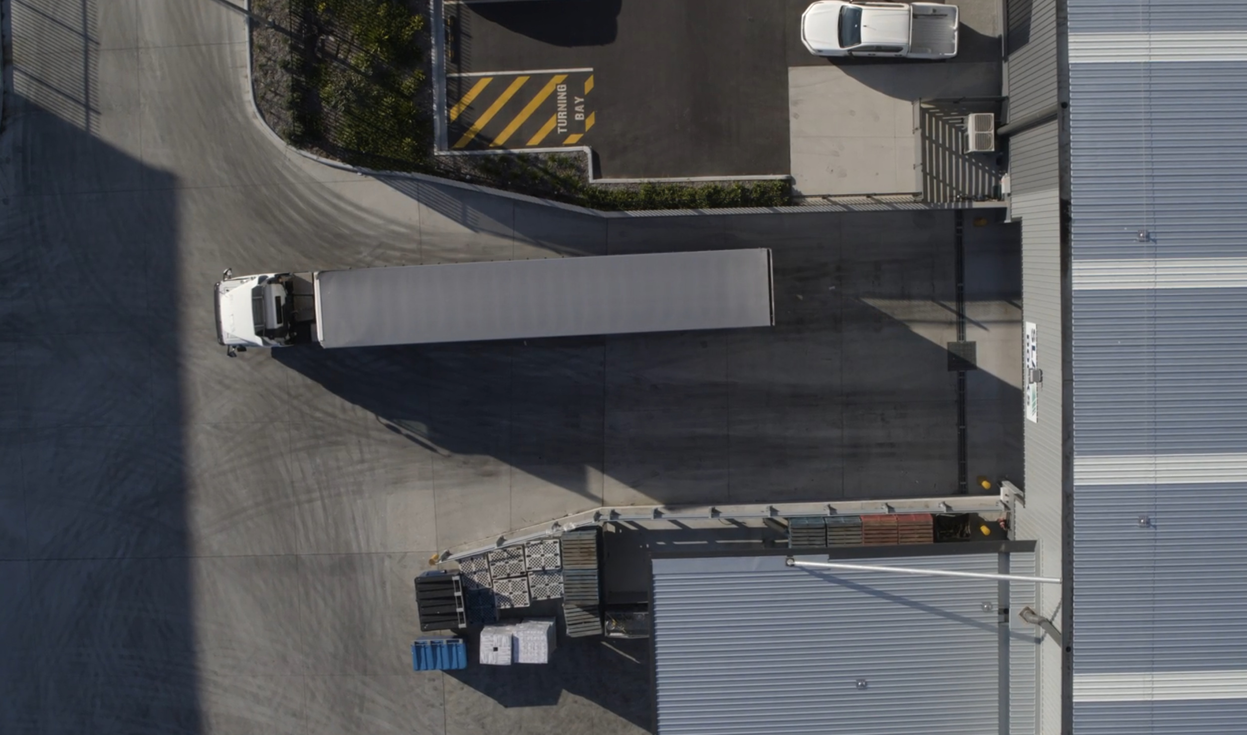 Freight truck moving through a distribution center